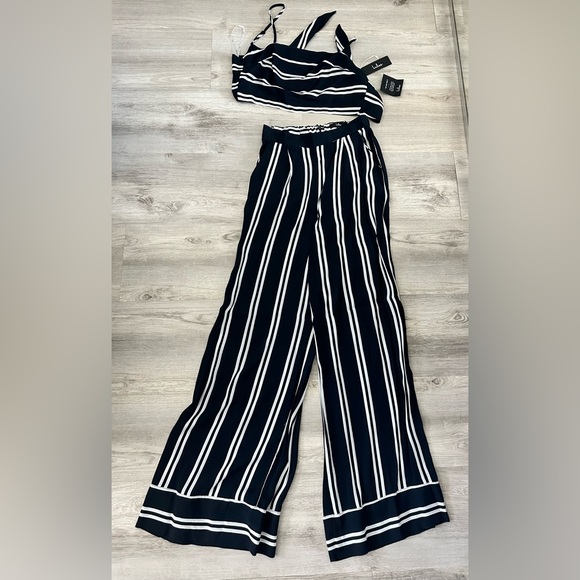New w/o tags. Lulu’s Coastal Living Blue/White Striped 2 Piece Jumpsuit. - Picture 8 of 8